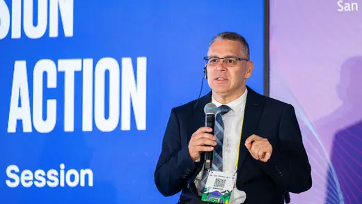 A panellist addressing the first high level panel