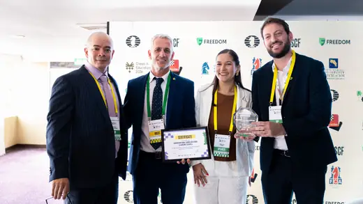 Award recipients with their certificate and trophy