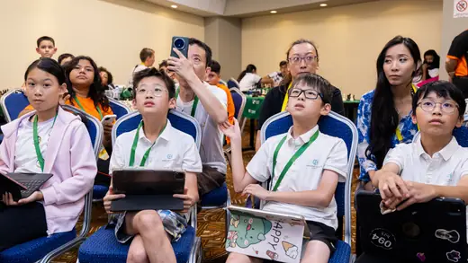 Players answering the Kahoot chess quiz from their phones