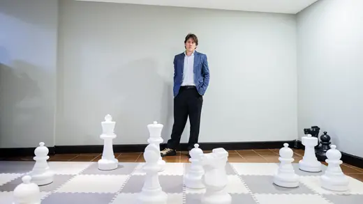 The master alone on the giant floor board before the game