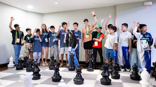 Young players voting on the next move with a show of hands
